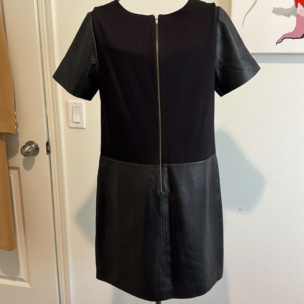 Leather dress. Size S. Two front pockets. Almost new condition.